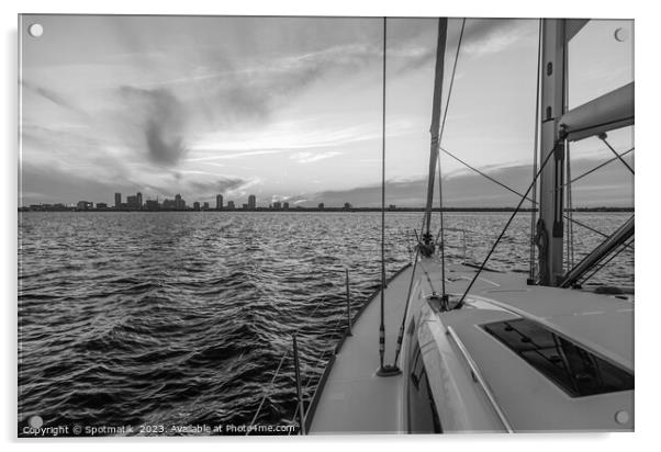 Yacht sailing towards cityscape on horizon at sunset Acrylic by Spotmatik 