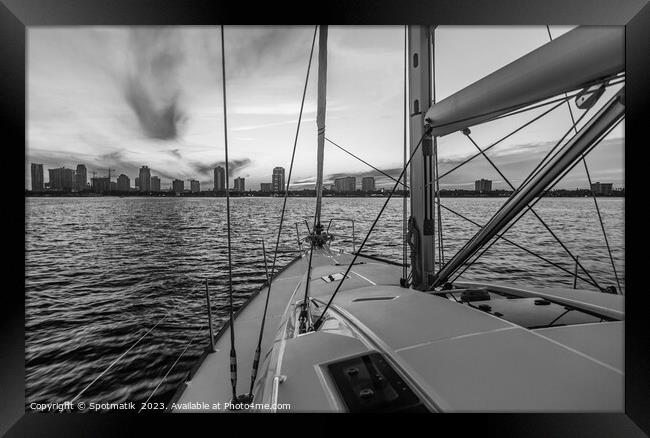 Cityscape view from luxury yacht with beautiful sunrise Framed Print by Spotmatik 
