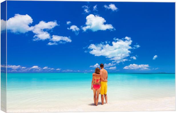 Happy Caucasian couple together on beach holiday Caribbean Canvas Print by Spotmatik 