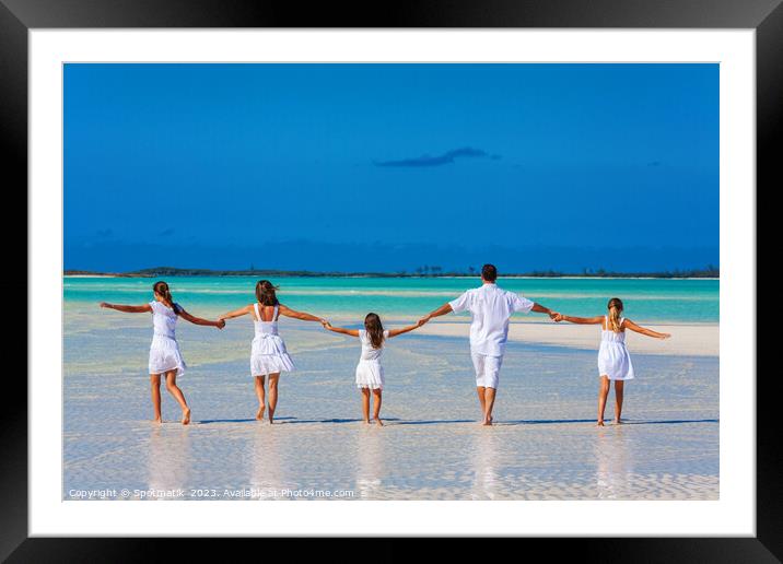 Healthy Caucasian family together on beach vacation Bahamas Framed Mounted Print by Spotmatik 