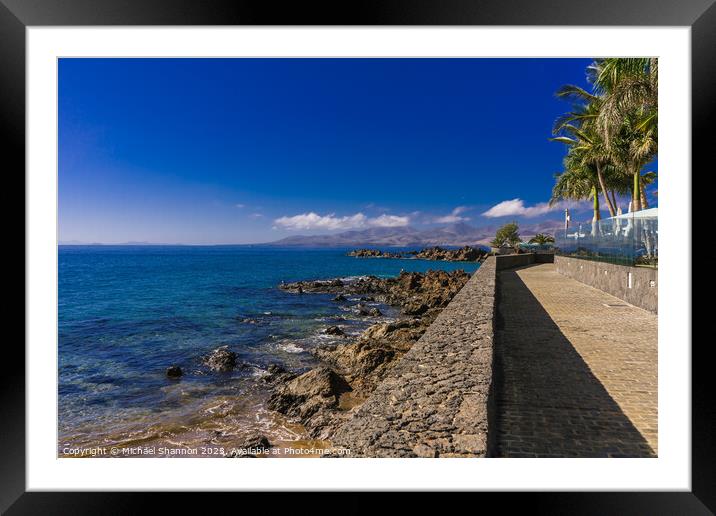 Sea view southwards from the promenade in Puerto d Framed Mounted Print by Michael Shannon
