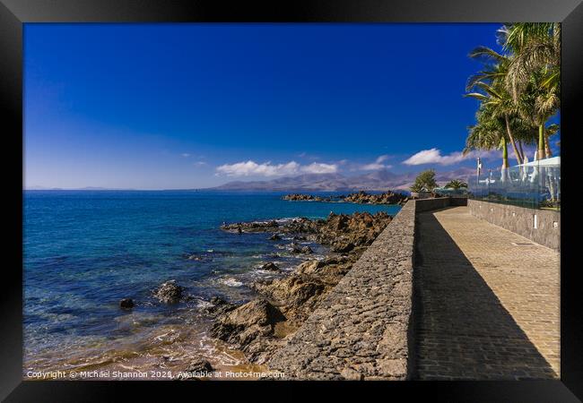Sea view southwards from the promenade in Puerto d Framed Print by Michael Shannon