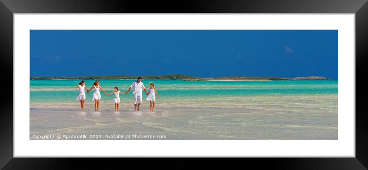 Panorama of mother father with family walking on beach  Framed Mounted Print by Spotmatik 