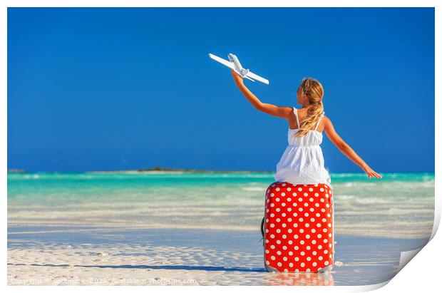 Girl sitting on red travel luggage on beach plane Print by Spotmatik 