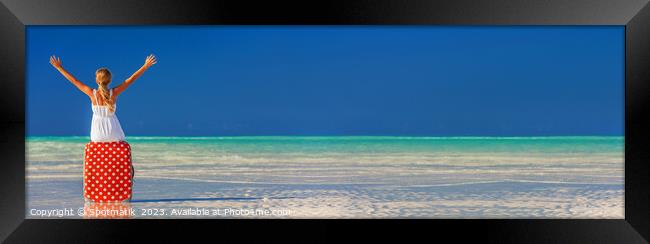 Panorama of female traveler on Bahamas ocean beach Framed Print by Spotmatik 