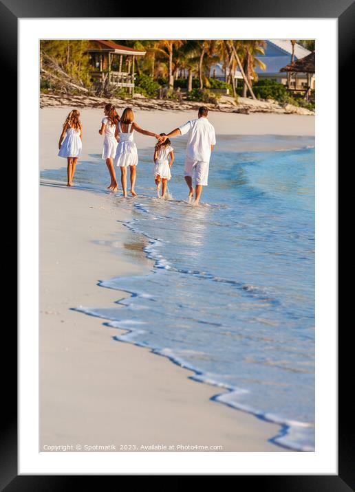 Young Caucasian girls parents on tropical island beach Framed Mounted Print by Spotmatik 