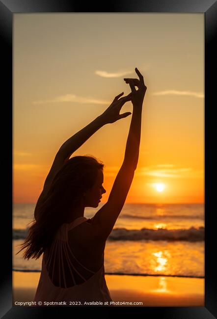 Healthy outdoor lifestyle Bohemian girl dancing on beach Framed Print by Spotmatik 