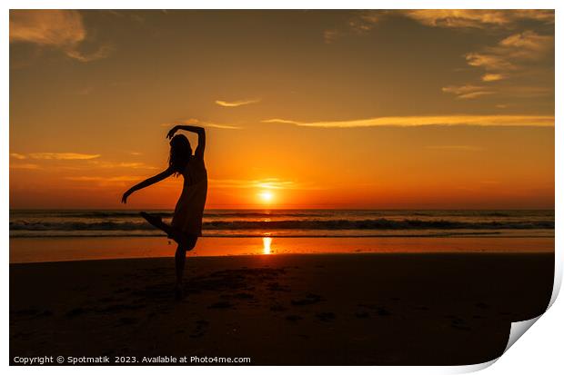 Happy young girl dancing on beach at sunset Print by Spotmatik 