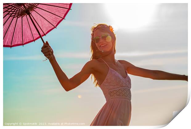 Young American female dancing on beach with parasol Print by Spotmatik 