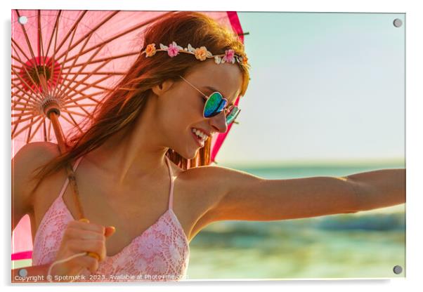 Hippy chic in sunglasses by ocean with parasol Acrylic by Spotmatik 