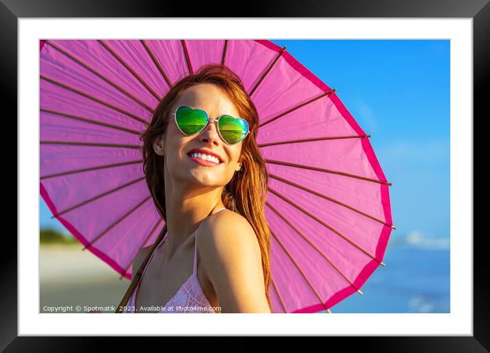 Hippy chic with parasol smiling in beach vacation Framed Mounted Print by Spotmatik 