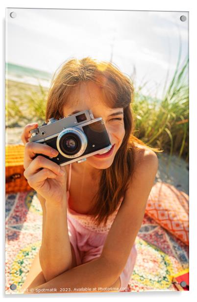 Smiling Caucasian girl with camera photographing beach vacation Acrylic by Spotmatik 