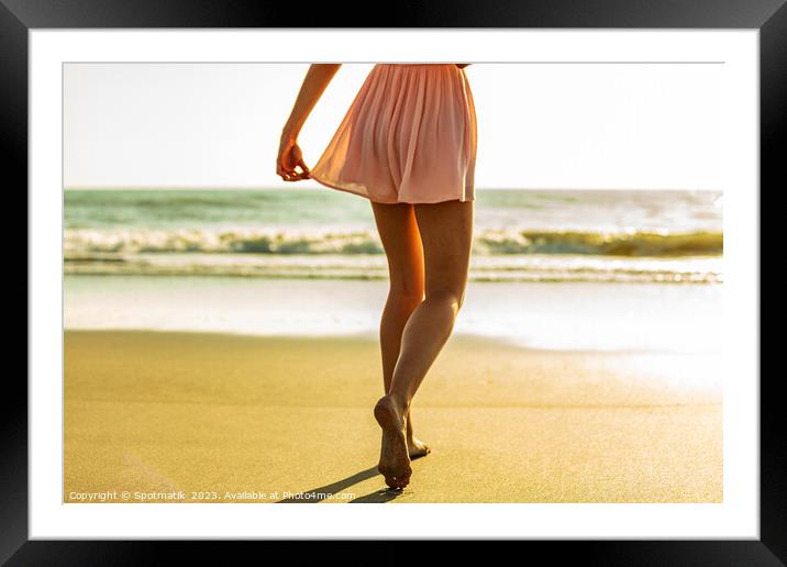 Young girl enjoying solo beach vacation at sunset Framed Mounted Print by Spotmatik 