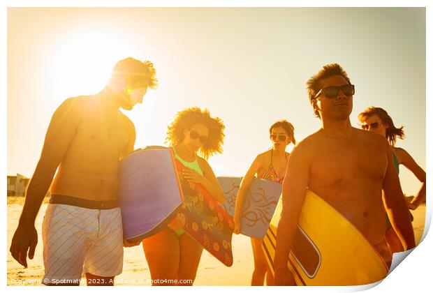 Group of friends with bodyboards on beach vacation Print by Spotmatik 