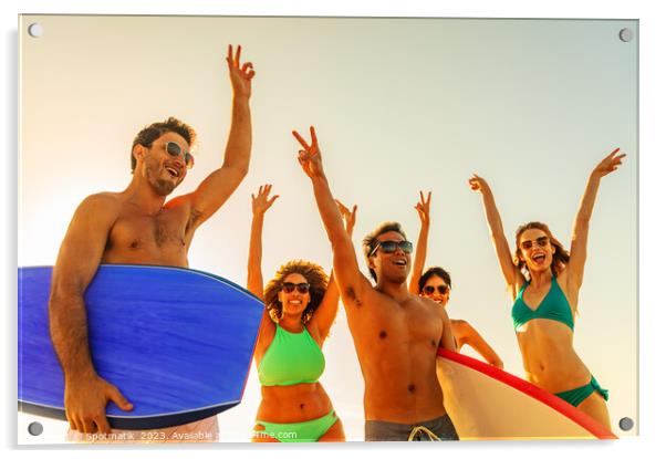 Friends enjoying carefree fun going bodyboarding on beach Acrylic by Spotmatik 