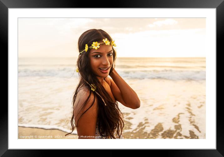 Indian woman by the ocean wearing flower headband Framed Mounted Print by Spotmatik 
