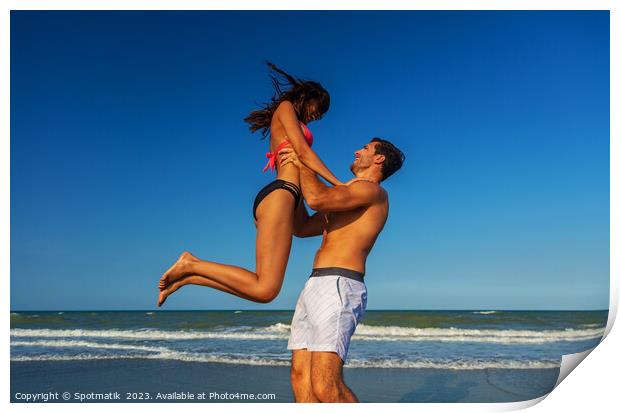 Male and female in swimwear enjoying Summer fun Print by Spotmatik 