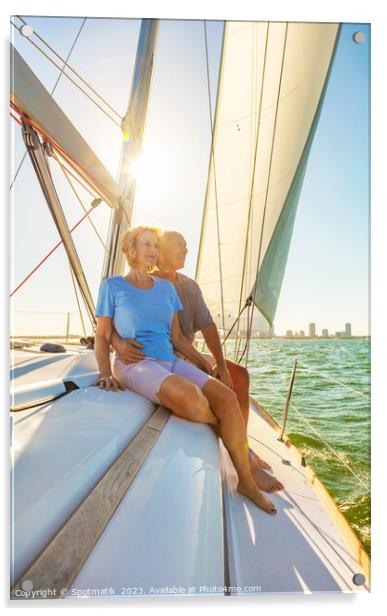 Senior couple enjoying togetherness on yacht at sunset Acrylic by Spotmatik 