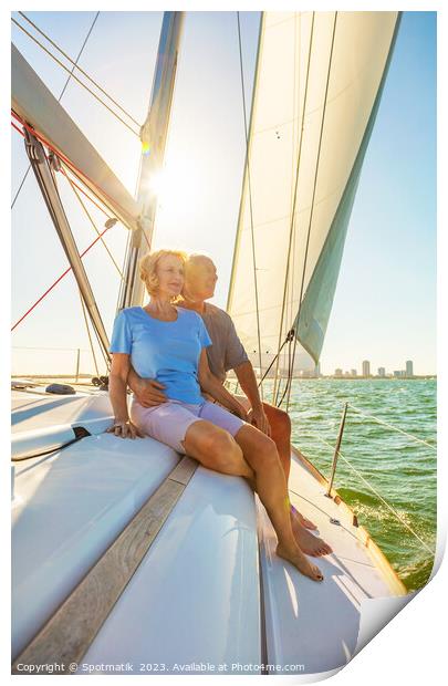 Senior couple enjoying togetherness on yacht at sunset Print by Spotmatik 
