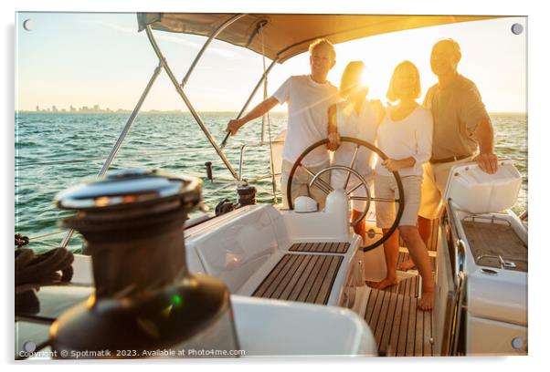 Senior friends enjoying retirement steering yacht at sunset Acrylic by Spotmatik 