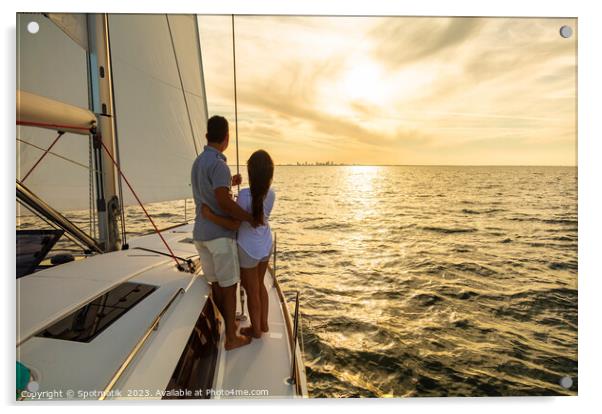 Hispanic couple travelling on luxury yacht at sunset Acrylic by Spotmatik 