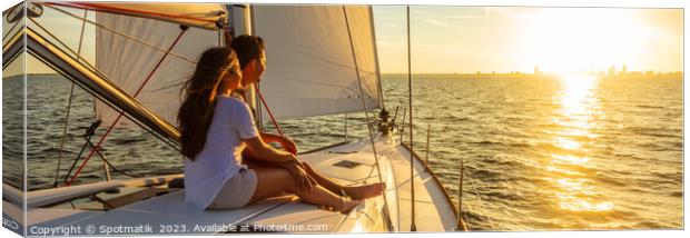 Panorama of young Hispanic couple at leisure on luxury yacht Canvas Print by Spotmatik 