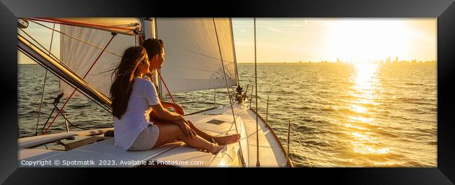 Panorama of young Hispanic couple at leisure on luxury yacht Framed Print by Spotmatik 