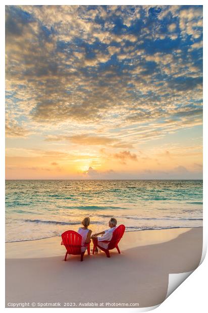 Retired Caucasian couple on beach at sunset Bahamas Print by Spotmatik 
