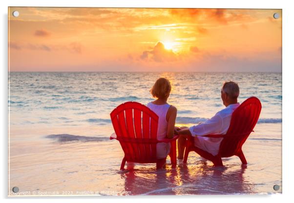 Retired couple enjoying sunset view over ocean Bahamas Acrylic by Spotmatik 