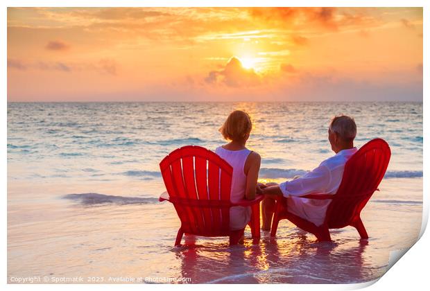 Retired couple enjoying sunset view over ocean Bahamas Print by Spotmatik 