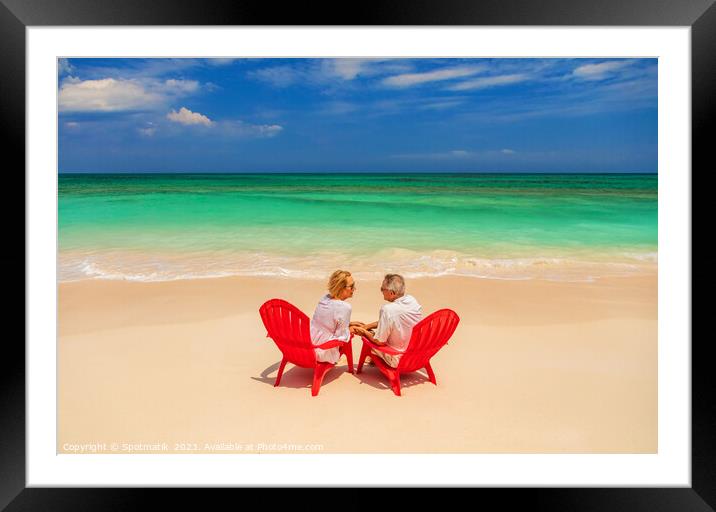 Turquoise ocean view for retired couple on beach Framed Mounted Print by Spotmatik 