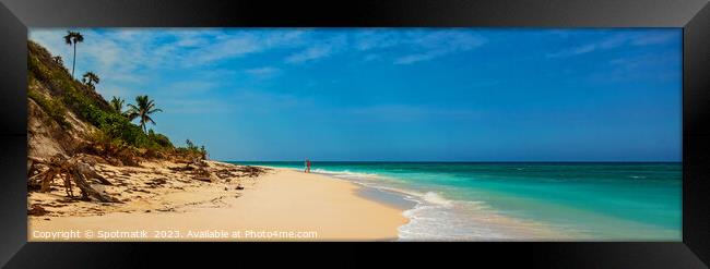 Panoramic beach view with seniors on romantic vacation Framed Print by Spotmatik 