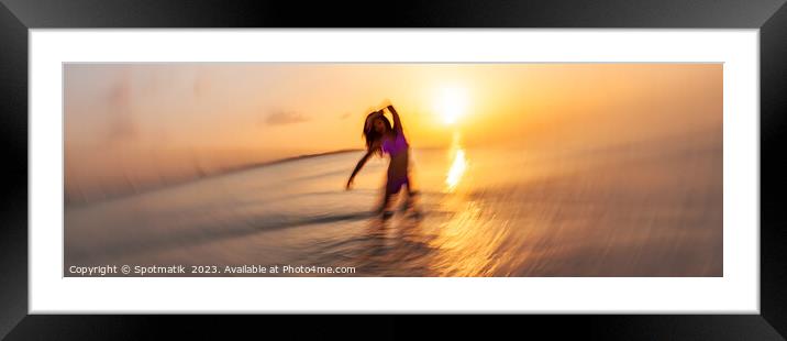 Panoramic ocean sunset with dancing female motion blur Framed Mounted Print by Spotmatik 