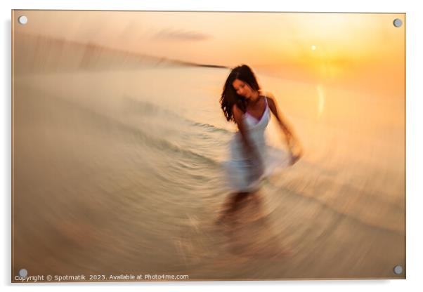 Motion blurred dancing Asian girl in ocean sunset Acrylic by Spotmatik 