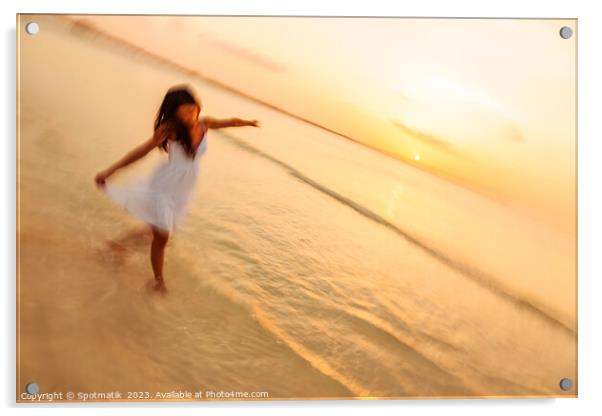 Motion blur carefree Asian female dancing on shoreline Acrylic by Spotmatik 