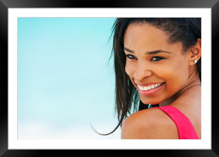 Portrait of happy African American female on vacation Framed Mounted Print by Spotmatik 