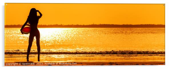 Panoramic Asian girl watching sunset over shimmering ocean Acrylic by Spotmatik 