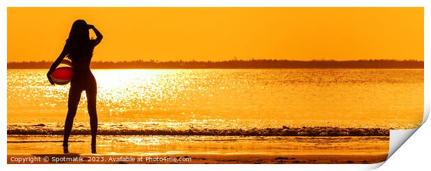 Panoramic Asian girl watching sunset over shimmering ocean Print by Spotmatik 