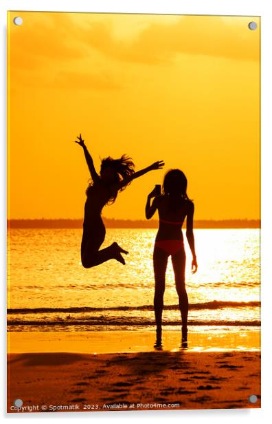 Tropical ocean sunrise with girl photographing friend jumping Acrylic by Spotmatik 