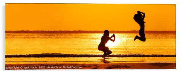 Panoramic ocean sunrise with girl jumping for photo Acrylic by Spotmatik 