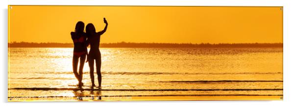 Panoramic ocean sunrise with females silhouette taking selfie Acrylic by Spotmatik 