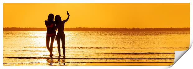 Panoramic ocean sunrise with females silhouette taking selfie Print by Spotmatik 