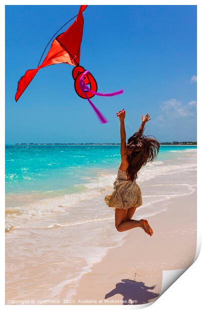 Happy Asian girl jumping by ocean flying kite Print by Spotmatik 
