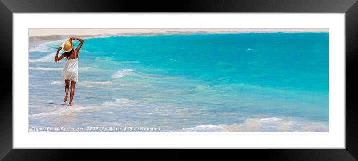 Panoramic young woman walking happily in ocean waves Framed Mounted Print by Spotmatik 