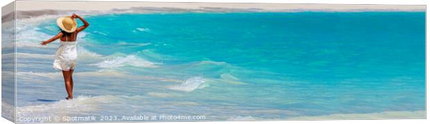 Panoramic happy girl walking through waves on beach Canvas Print by Spotmatik 