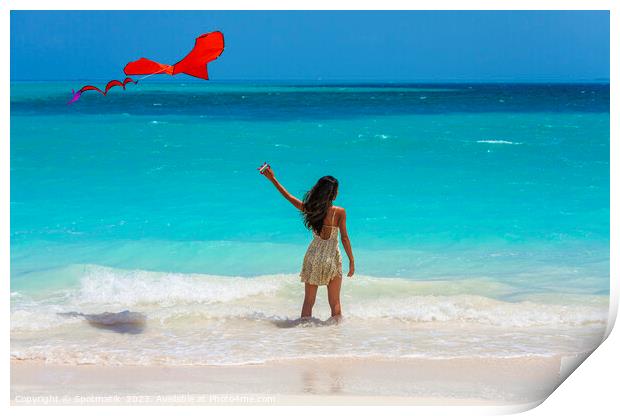Asian girl standing in ocean waves flying kite Print by Spotmatik 