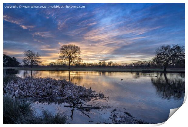 Frosty February sunrise at Bushy Park ponds Print by Kevin White