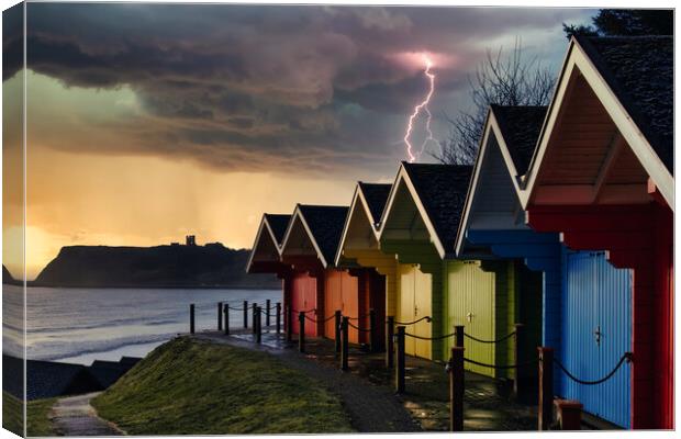Dramatic Scarborough Beach Huts Canvas Print by Tim Hill