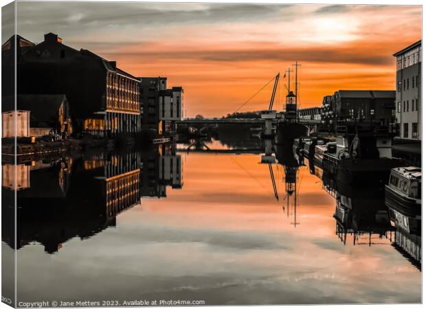 The Sun Setting over the Docks  Canvas Print by Jane Metters