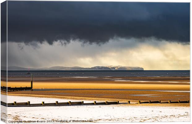 Snow Beach And A Storm Wales Canvas Print by Adrian Evans
